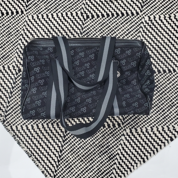 TNA Handbags - ARITZIA TNA Vintage Mini Travel TNA Logo Tote Bag